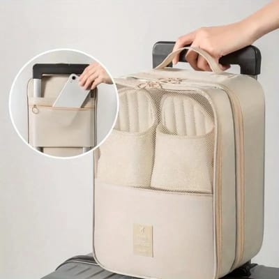 Beige Travel Shoe Organizer: Using the back sleeve on a suitcase handle