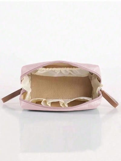 Pink Compact Makeup Bag: Open interior and elastic compartments