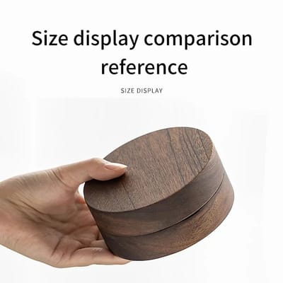 Lidded Ashtray with Wood Surround: Closed container held for scale
