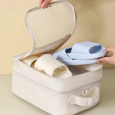 Beige Travel Shoe Organizer: Opening the beige organizer