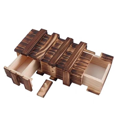 Wooden puzzle box with both end drawers open and a sliding piece removed.