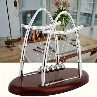 Arched Newton's Cradle: Angled view of the arched frame