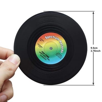 Vinyl Record Coaster Set: Coaster held for scale