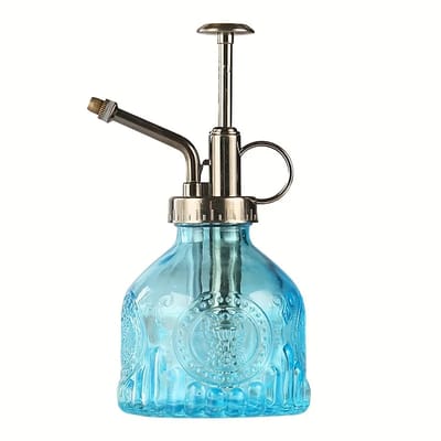 Blue Glass Plant Mister: Blue bottle and pump close-up
