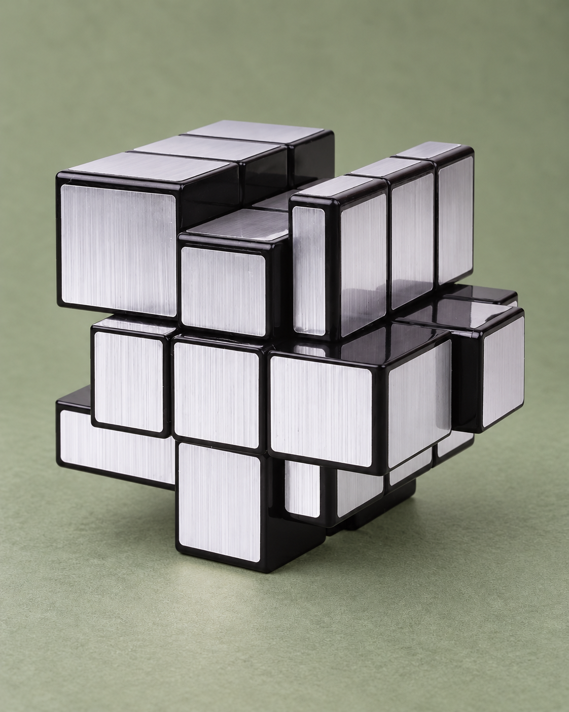 Silver 3×3 mirror puzzle cube with brushed reflective face stickers.